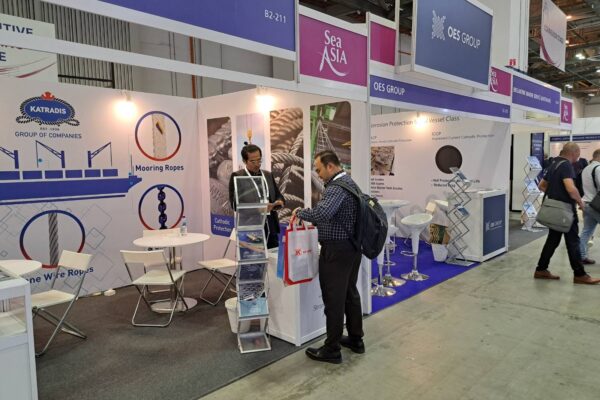 Booth interaction with brochure display at Katradis Sea Asia 2025