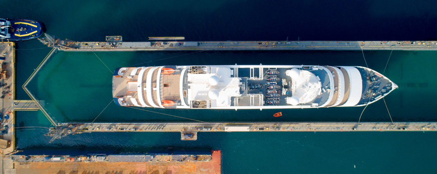 Greek shipyards continue to expand their capabilities through modernization projects and international maritime cooperation Cruise vessel in dry dock at a Greek shipyard undergoing maintenance and modernization
